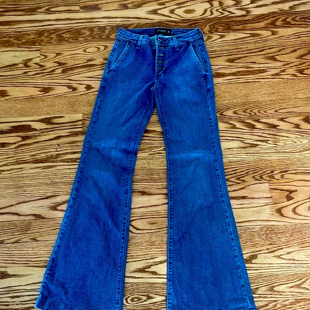 Just Black denim size 25 flare jeans. Needs one stitch on the back side.